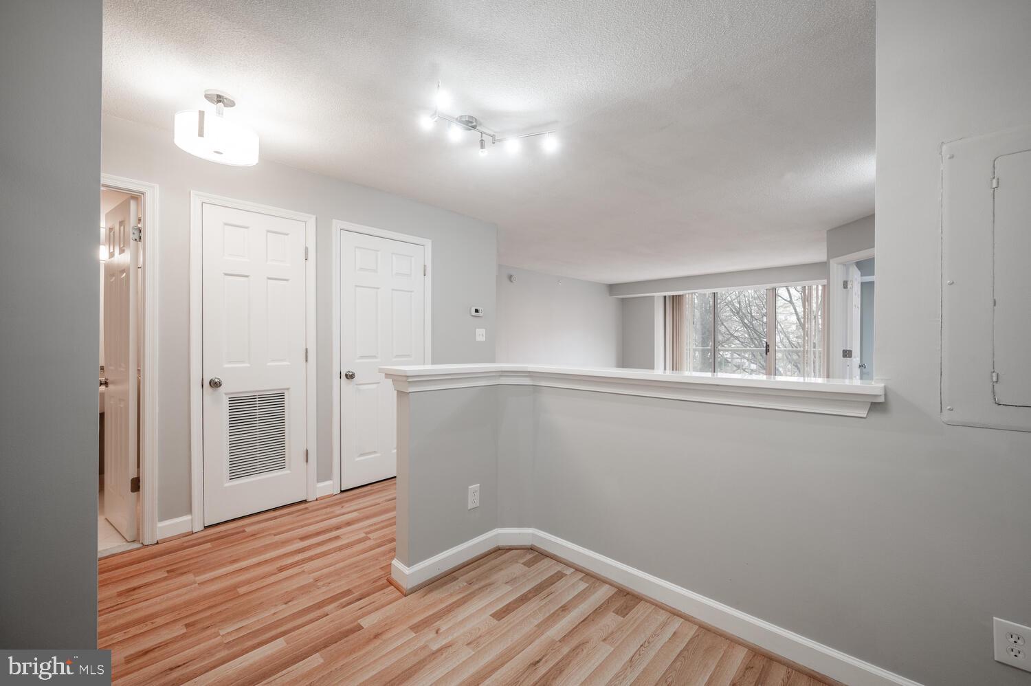 5000 Battery Lane, Unit 207 Bethesda, MD 20814 - Photo 6 of 34 a view of a room with wooden floor and entryway
