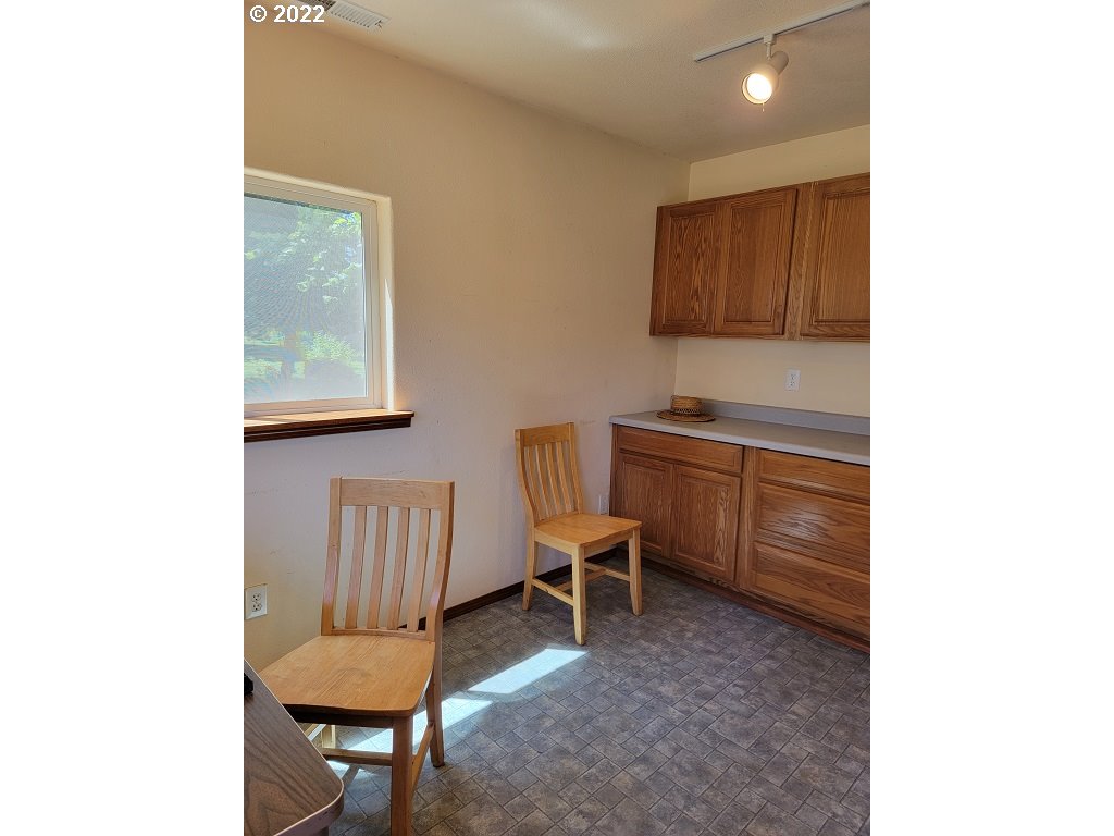 26817 Northeast Hathaway Road Camas, WA 98607 - Photo 12 of 25 a living room with furniture and a window