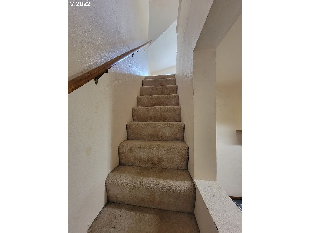 26817 Northeast Hathaway Road Camas, WA 98607 - Photo 15 of 25 a living room with furniture and stairs