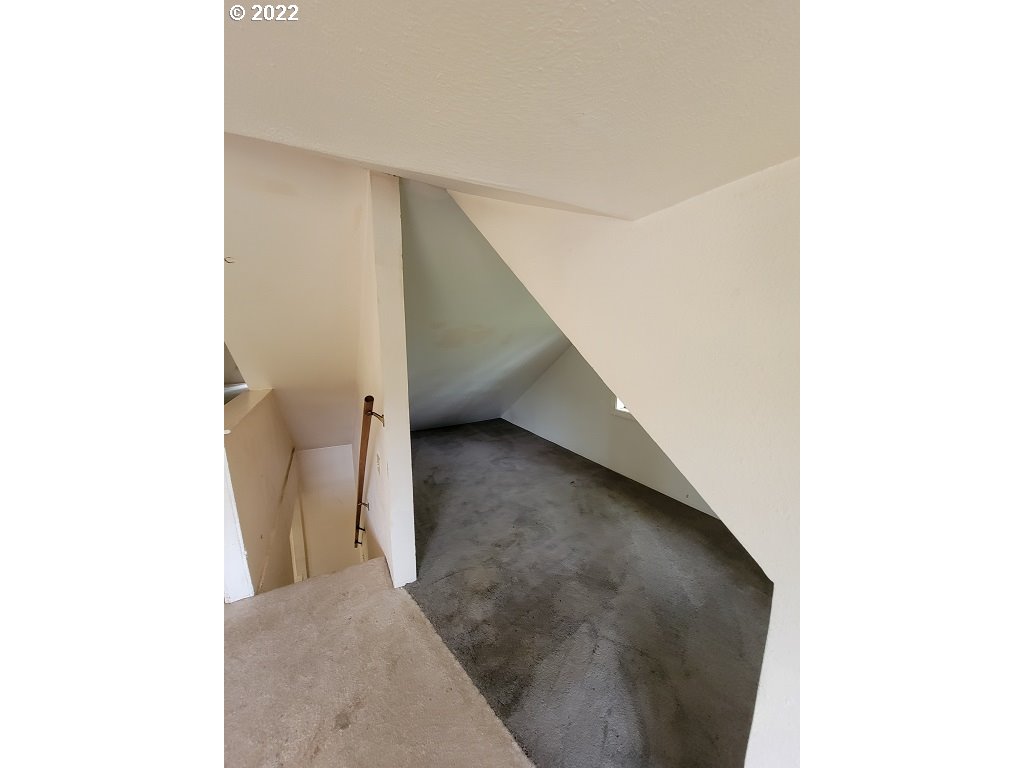 26817 Northeast Hathaway Road Camas, WA 98607 - Photo 17 of 25 a view of a hallway with staircase