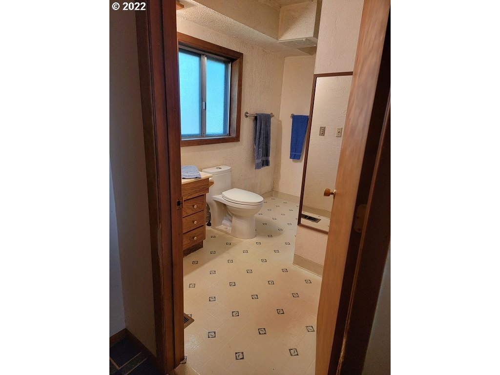 26817 Northeast Hathaway Road Camas, WA 98607 - Photo 19 of 25 a bathroom with a toilet and a shower