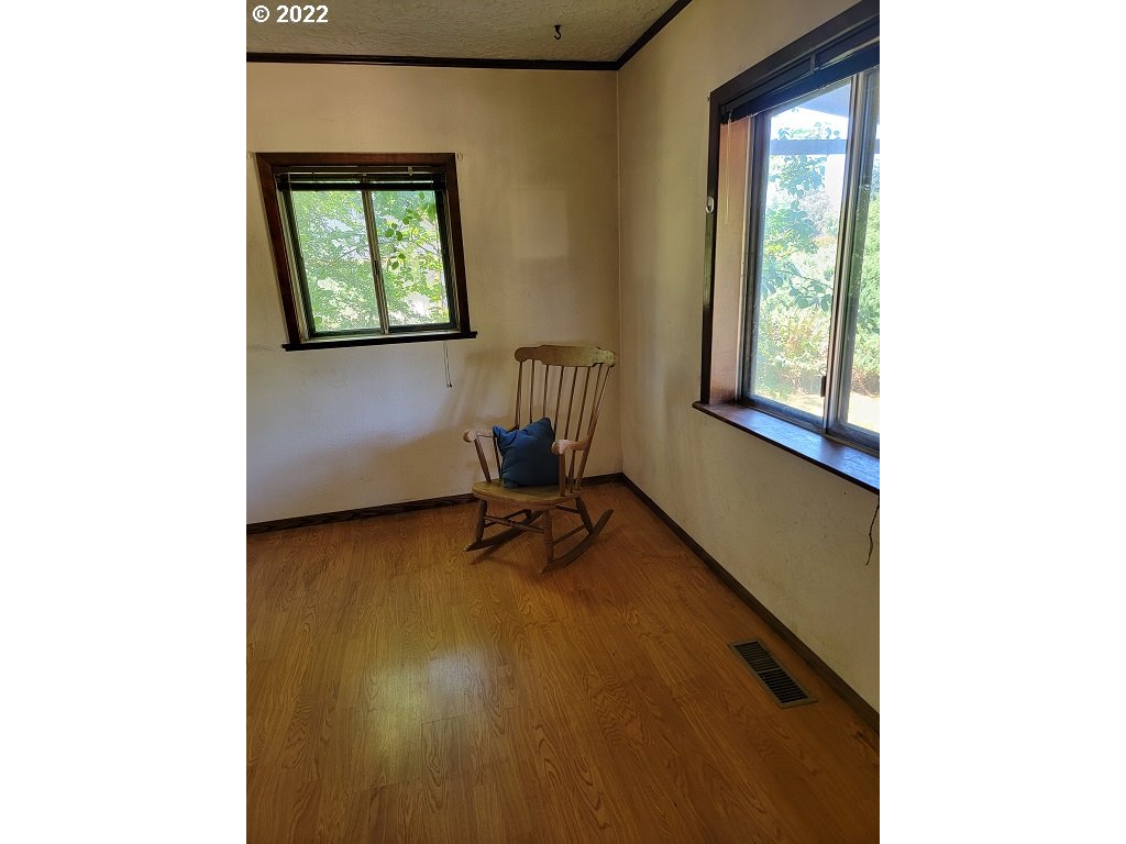 26817 Northeast Hathaway Road Camas, WA 98607 - Photo 23 of 25 a view of a room with a bench and a window