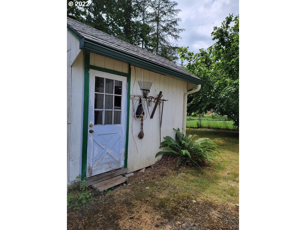 26817 Northeast Hathaway Road Camas, WA 98607 - Photo 5 of 25 a view of a bird house next to a yard