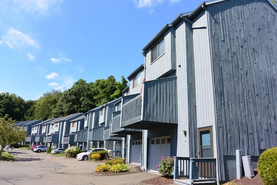 8 Driftway Road, Unit B3 Danbury, CT 06811 - Photo 1 of 1 a front view of a building with street