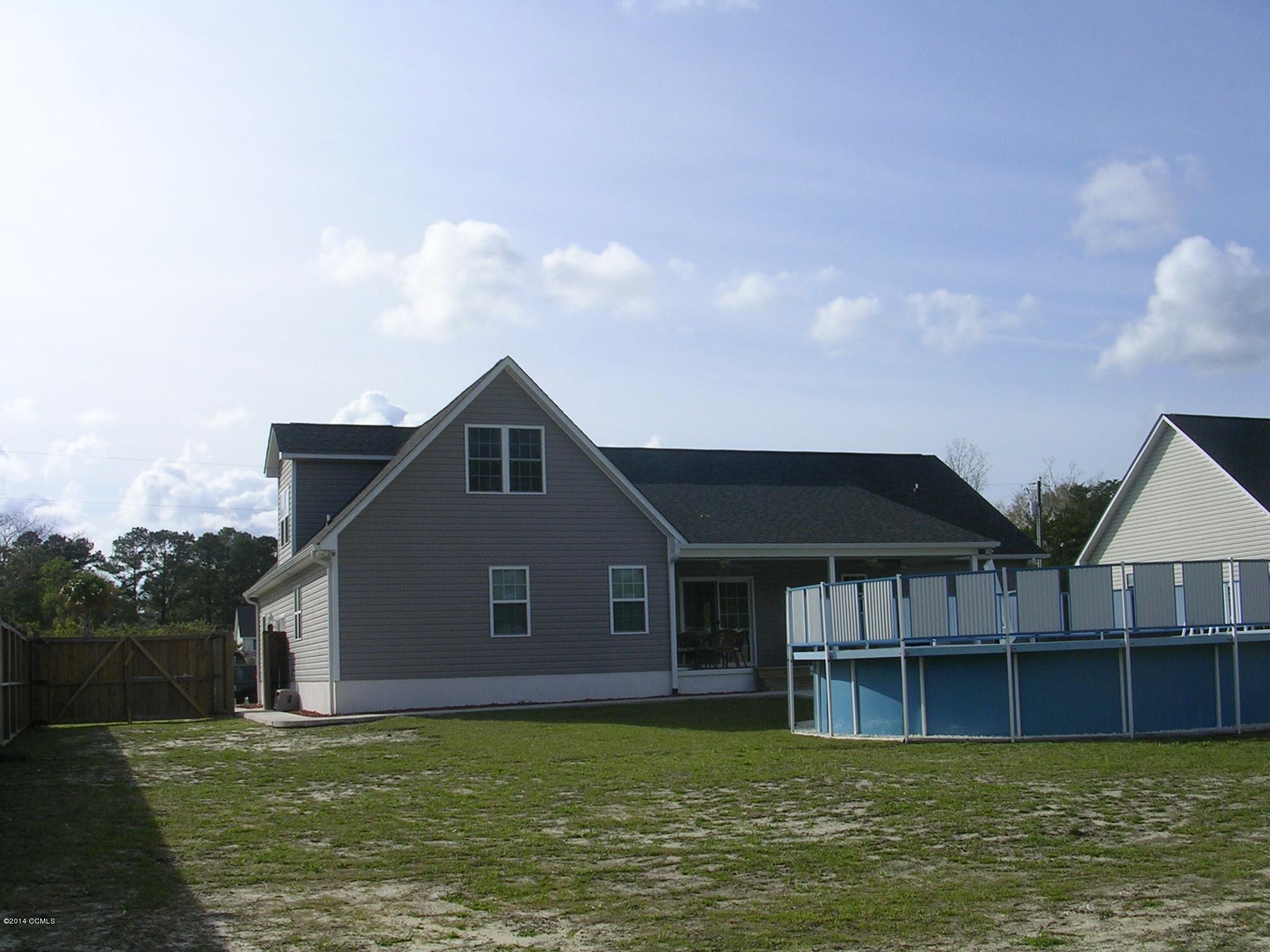 465 Nine Foot Road Newport, NC 28570 - Photo 26 of 33 back with pool