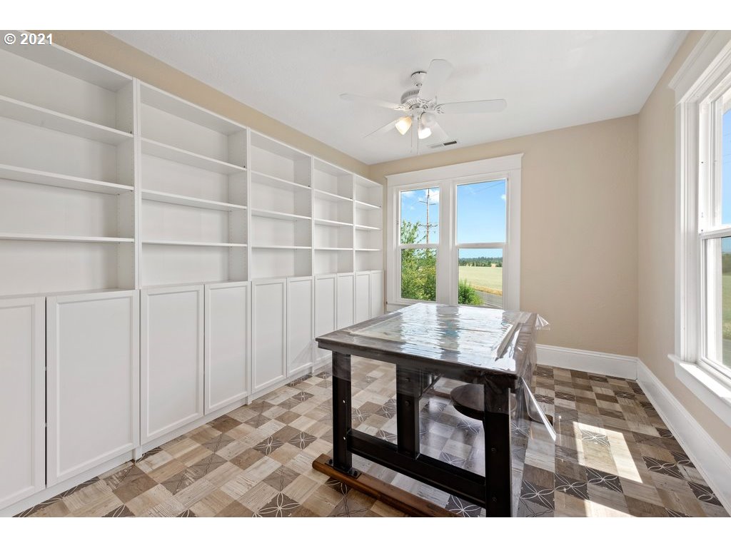 36902 South Kropf Road Woodburn, OR 97071 - Photo 20 of 26 a view of a workspace with furniture and a window