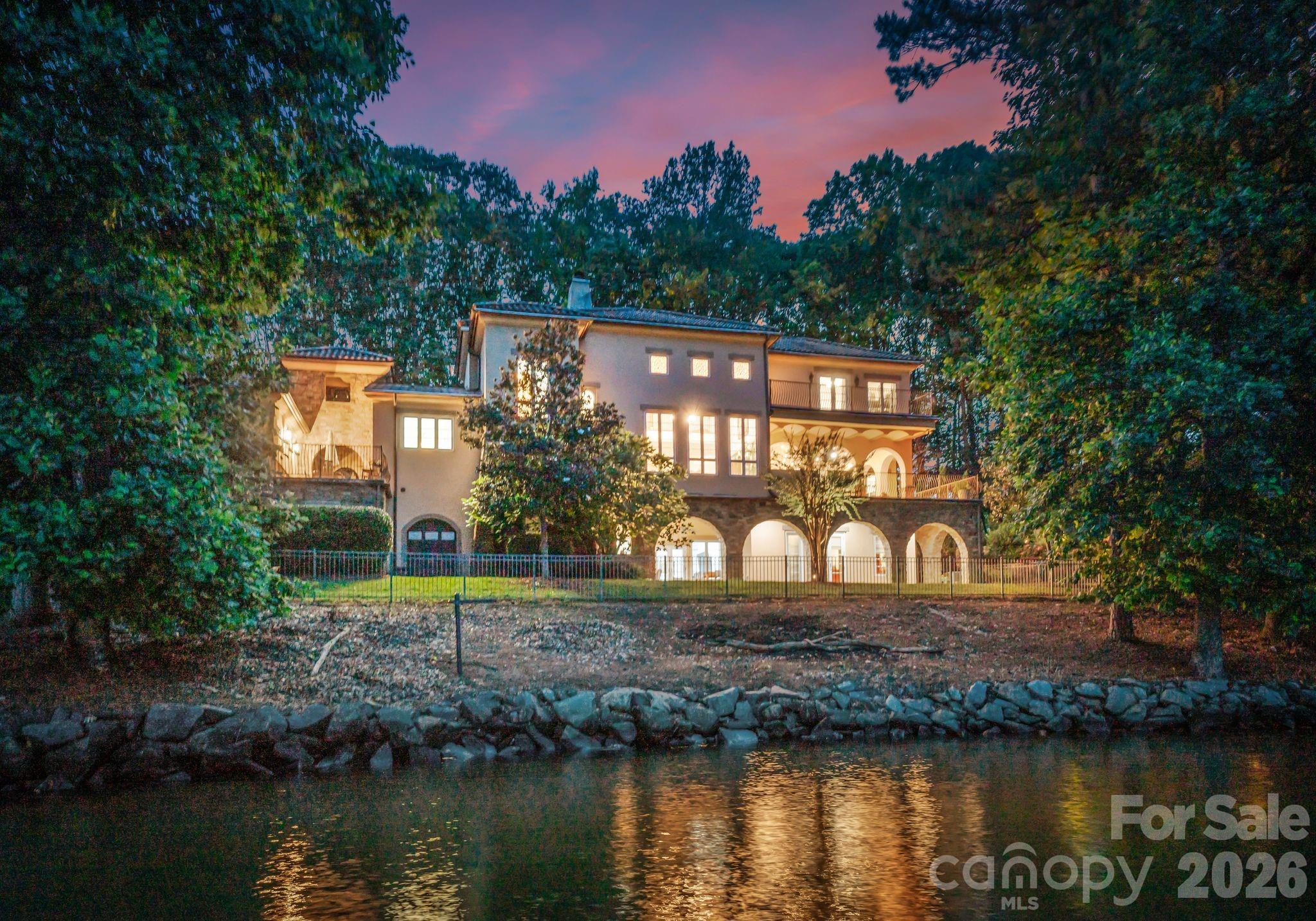 9184 Greenwood Road Terrell, NC 28682 - Photo 25 of 48 a view of a lake with a house in the background