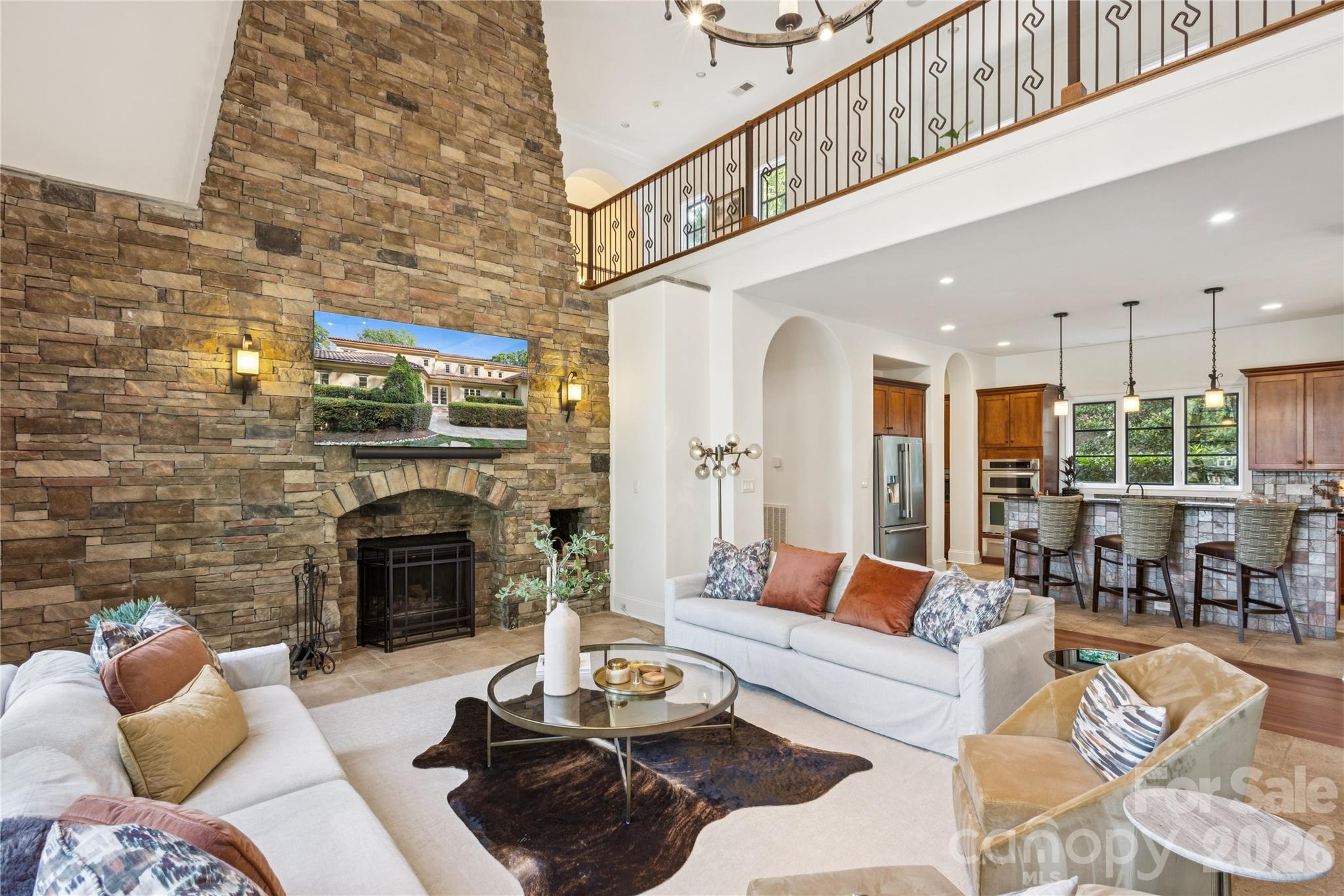 9184 Greenwood Road Terrell, NC 28682 - Photo 34 of 48 a living room with furniture potted plant and a fireplace