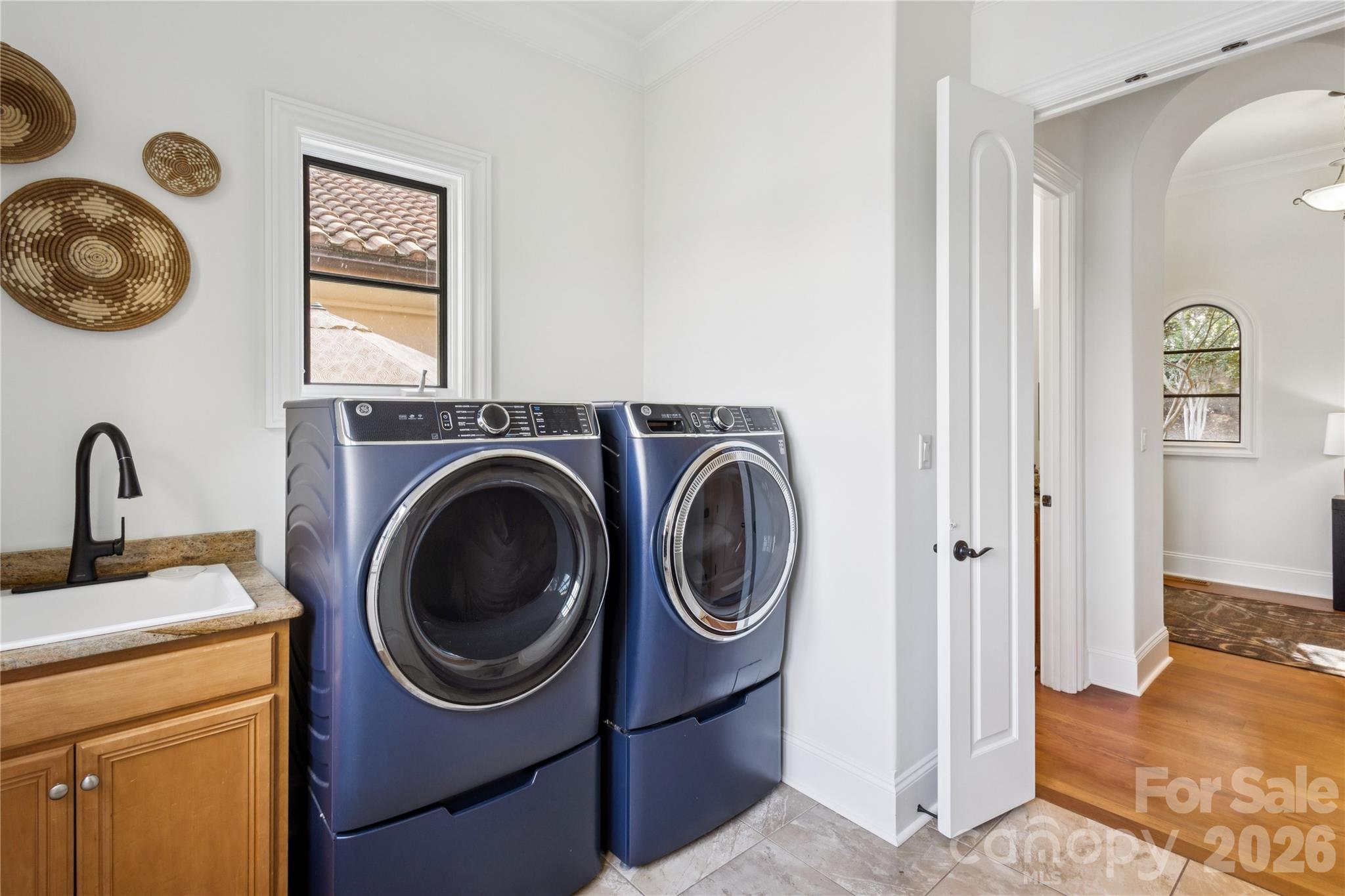 9184 Greenwood Road Terrell, NC 28682 - Photo 41 of 48 a view of a storage & utility room with a washer dryer