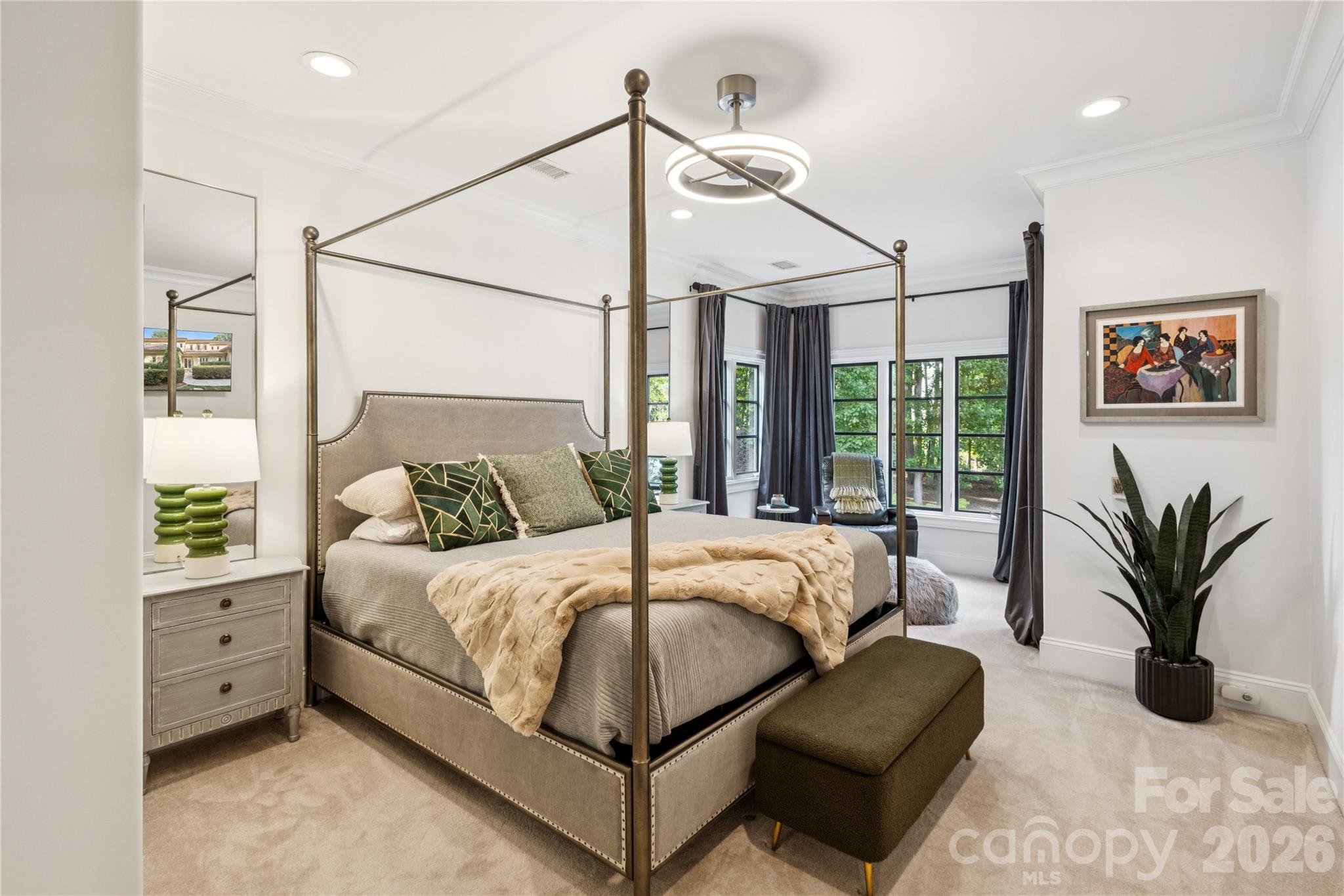 9184 Greenwood Road Terrell, NC 28682 - Photo 44 of 48 a bedroom with a large bed and a chandelier