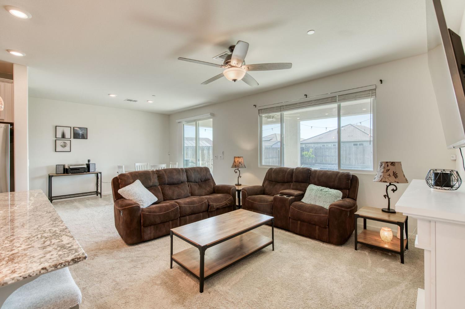 3606 Morro Rock Place Madera, CA 93637 - Photo 20 of 46 a living room with furniture and a large window