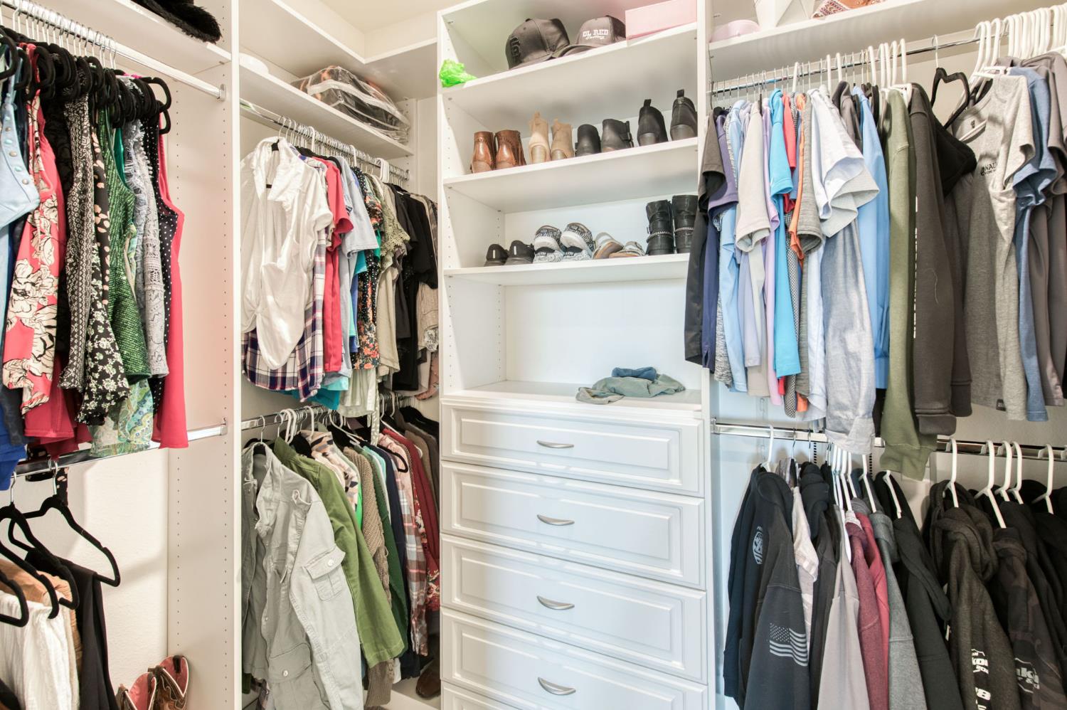 3606 Morro Rock Place Madera, CA 93637 - Photo 31 of 46 a view of walk in closet with clothes and shoes