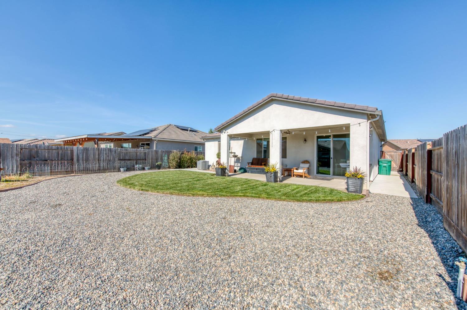3606 Morro Rock Place Madera, CA 93637 - Photo 40 of 46 a view of a house with a backyard