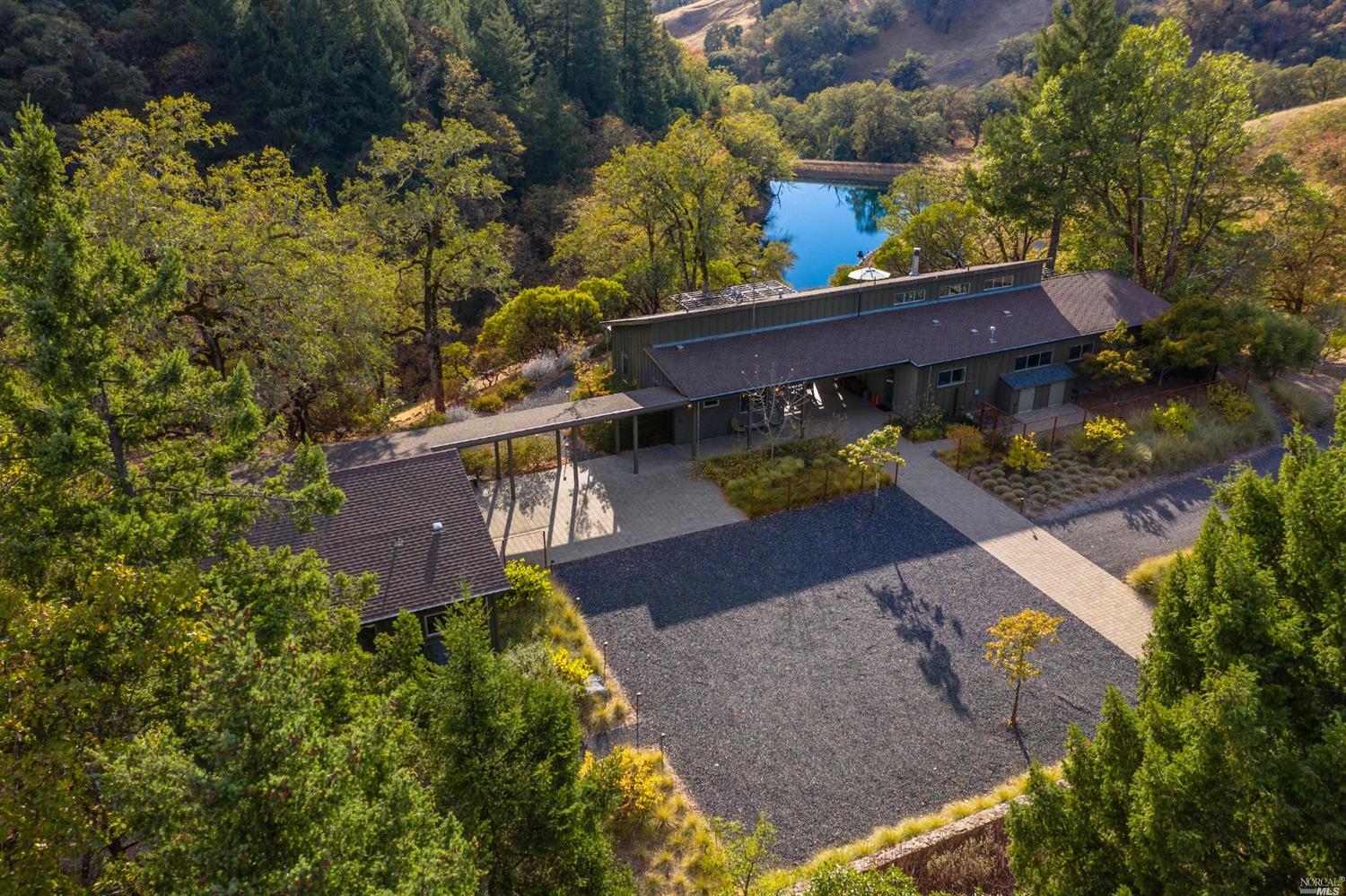 4900 Long Valley Ranch Road Ukiah, CA 95482 - Photo 1 of 1 an aerial view of a house with a yard basket ball court and outdoor seating