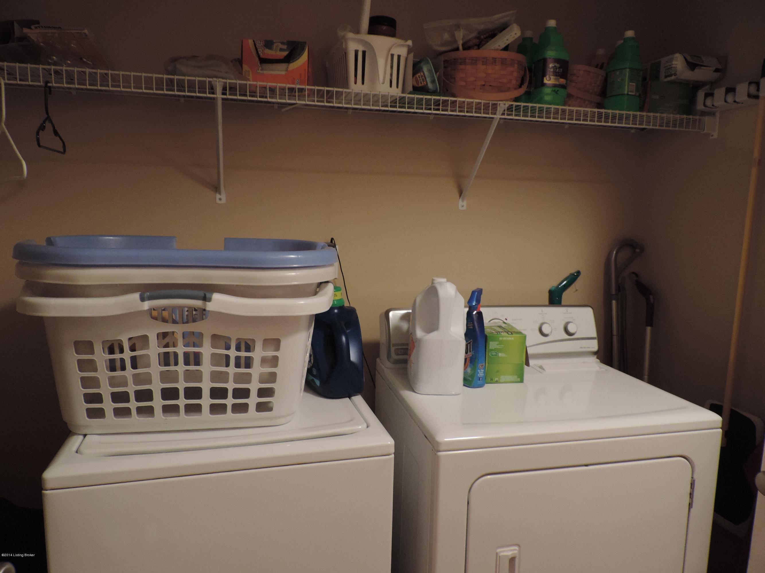 102 Jericho Ridge Court Smithfield, KY 40068 - Photo 17 of 27 Utility closet has plenty of room for taking care of the laundry and some storage.