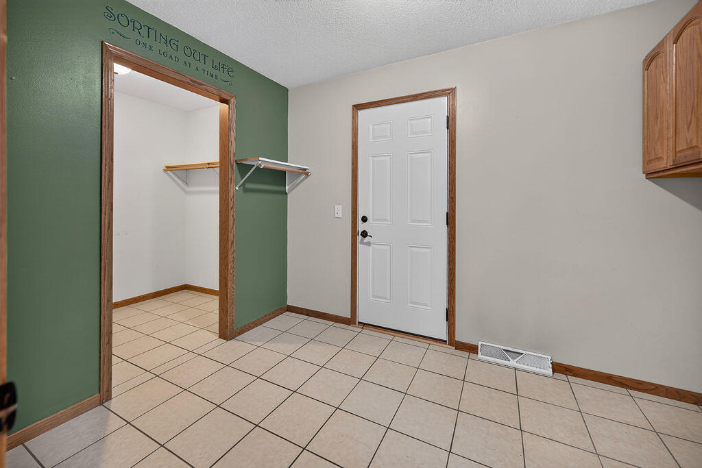 W28184 Bills Valley Road Arcadia, WI 54612 - Photo 42 of 57 Main floor laundry room