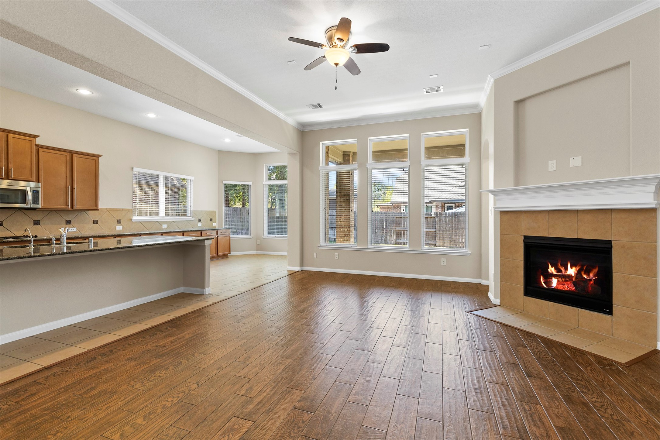 22023 Flashing Ridge Spring, TX 77389 - Photo 11 of 32 Kitchen open to family room