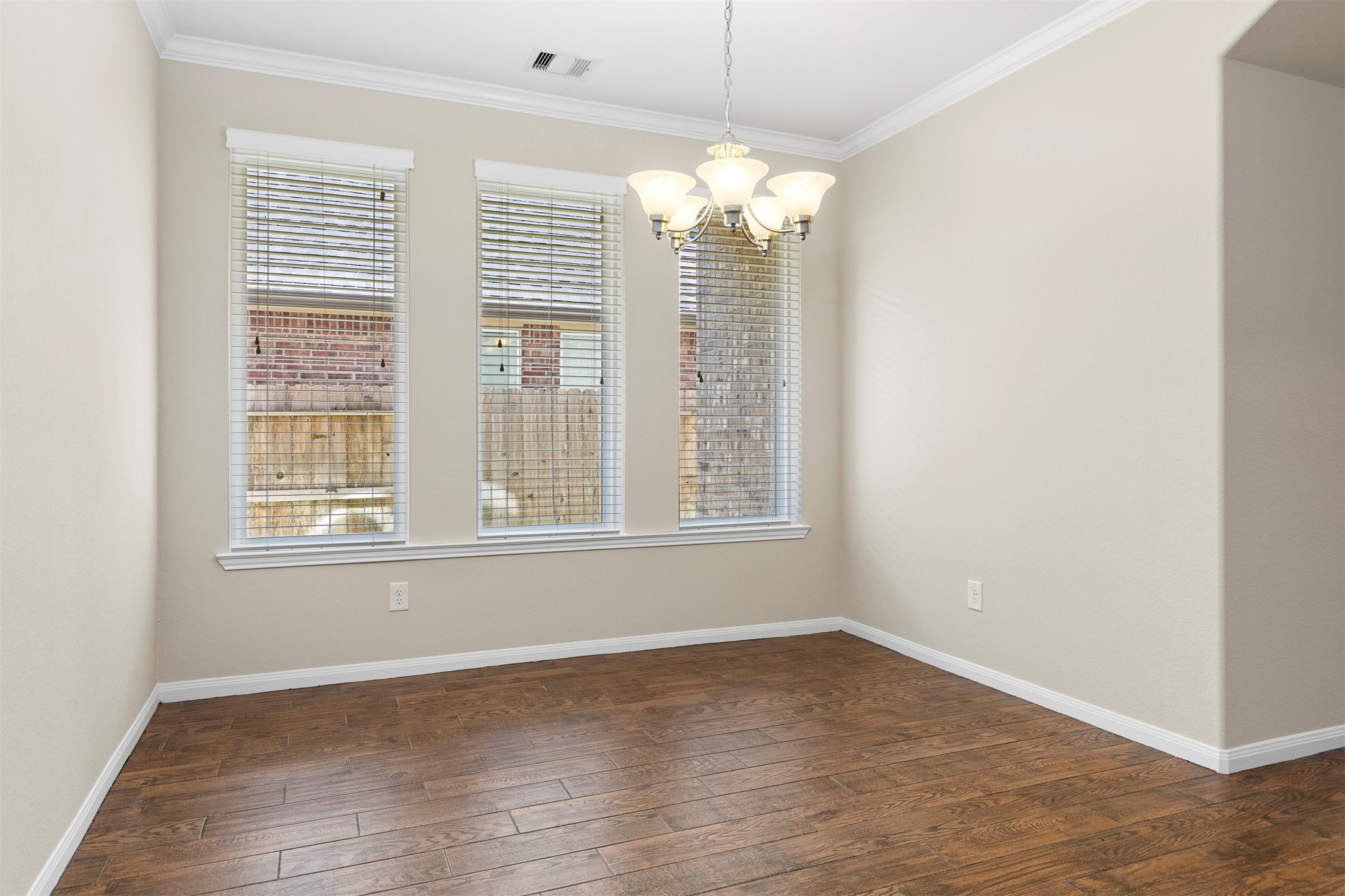 22023 Flashing Ridge Spring, TX 77389 - Photo 4 of 32 Dining room with a wall of windows.