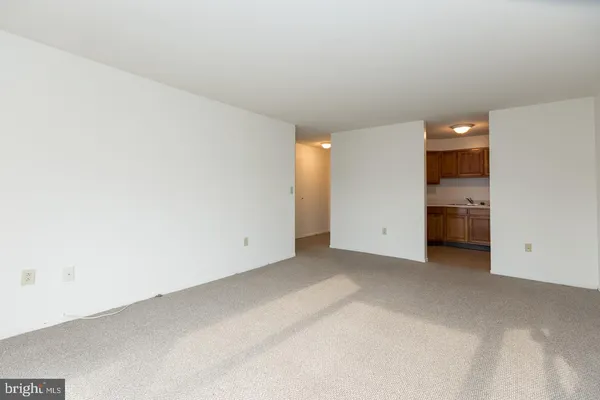 an empty room with a bathroom