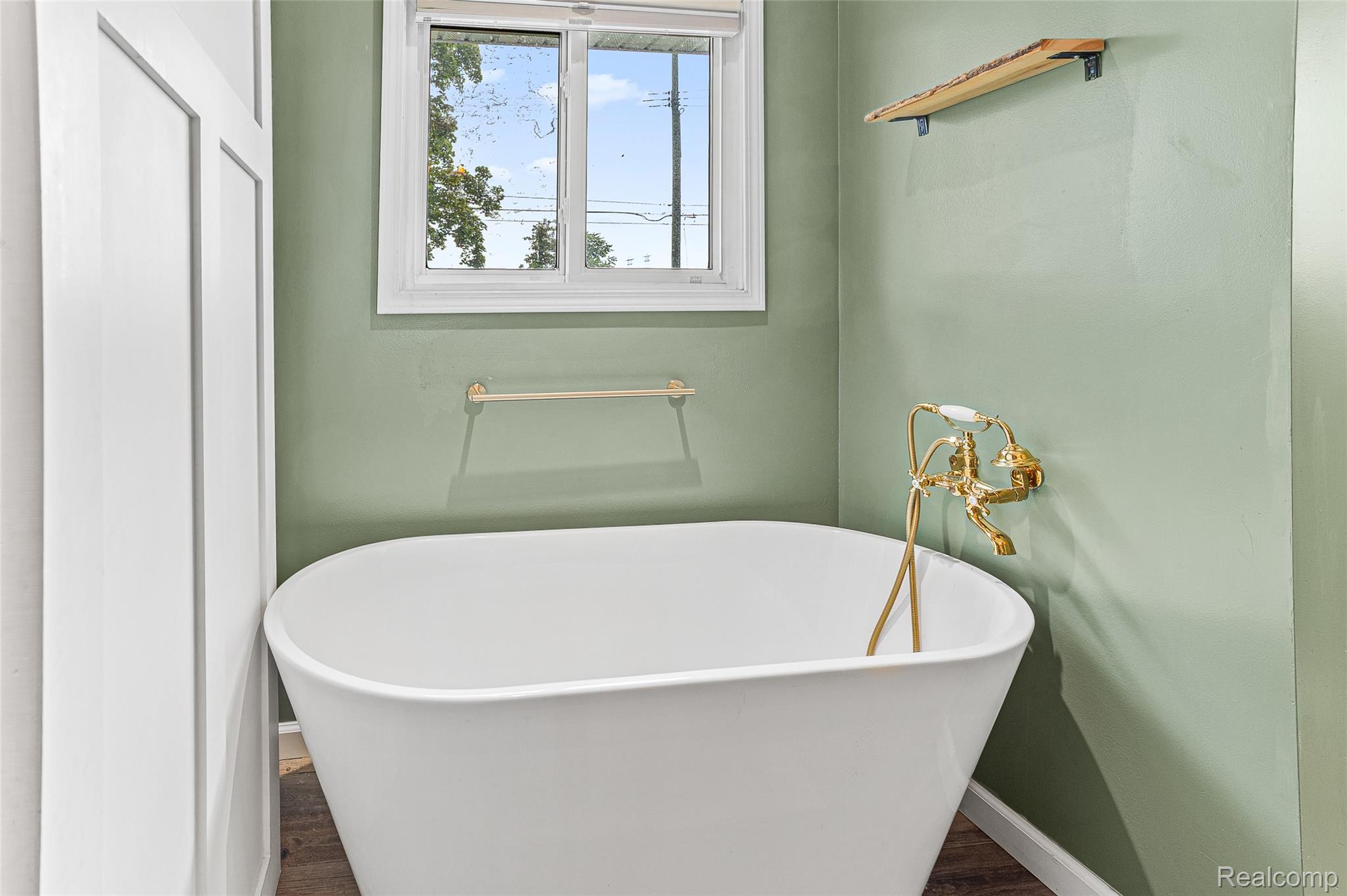 9561 Exeter Road Carleton, MI 48117 - Photo 23 of 46 Freestanding soaking tub with brass floor-mounted faucet