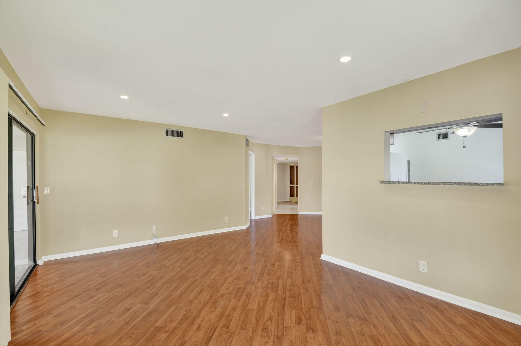 5040 Rose Hill Drive, Unit 206 Boynton Beach, FL 33437 - Photo 18 of 54 a view of empty room with wooden floor