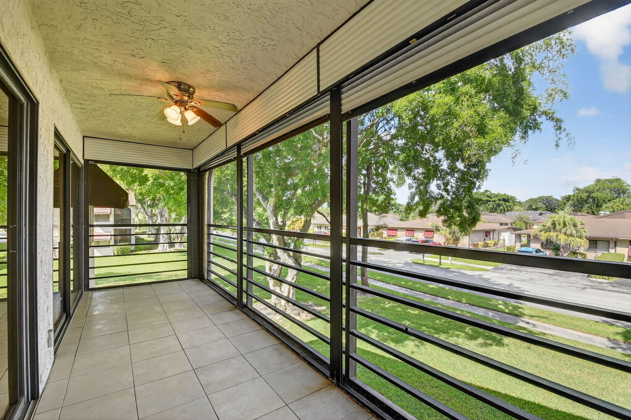 5040 Rose Hill Drive, Unit 206 Boynton Beach, FL 33437 - Photo 22 of 54 a view of two chairs in a balcony