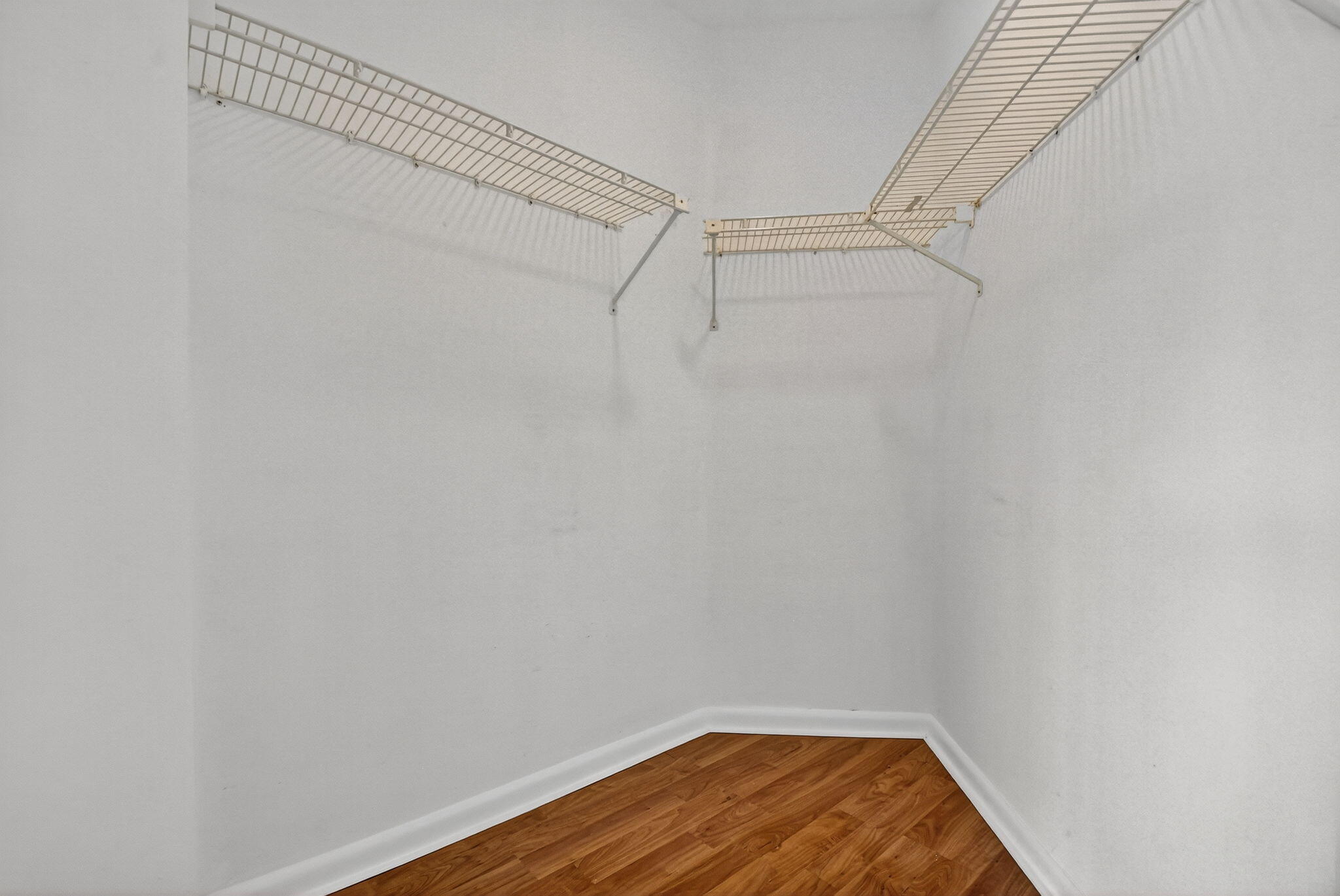 5040 Rose Hill Drive, Unit 206 Boynton Beach, FL 33437 - Photo 29 of 54 a view of a room with racks on the wall