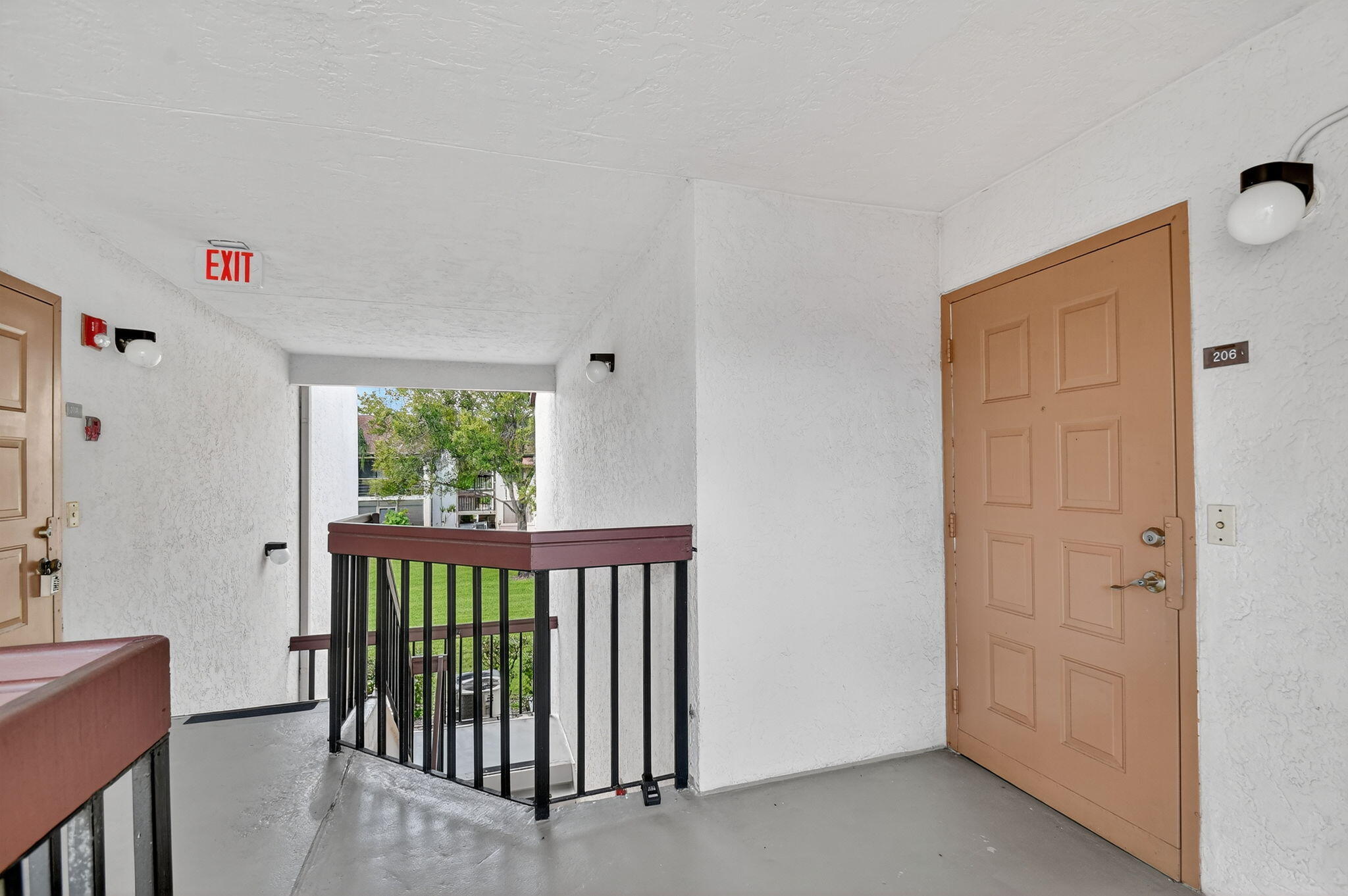 5040 Rose Hill Drive, Unit 206 Boynton Beach, FL 33437 - Photo 3 of 54 a view of a porch with furniture