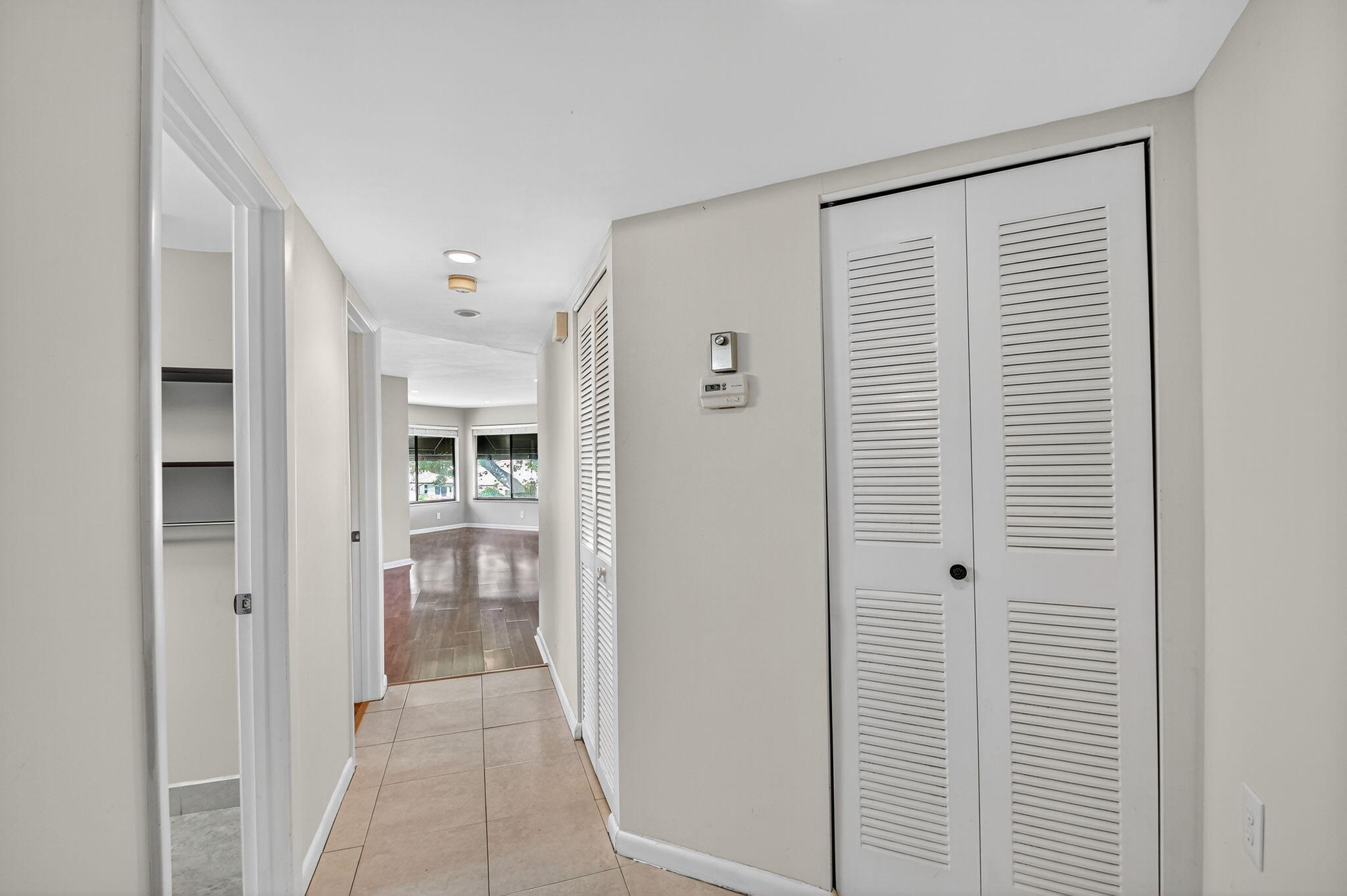 5040 Rose Hill Drive, Unit 206 Boynton Beach, FL 33437 - Photo 4 of 54 a view of hallway with bathroom and a shower