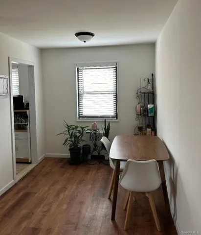 a bed room with a bed and a window