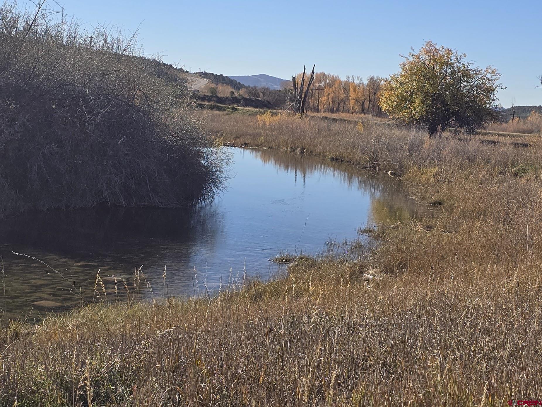 1308 Wrangler Way Durango, CO 81303 - Photo 14 of 18 a view of lake with mountain in background