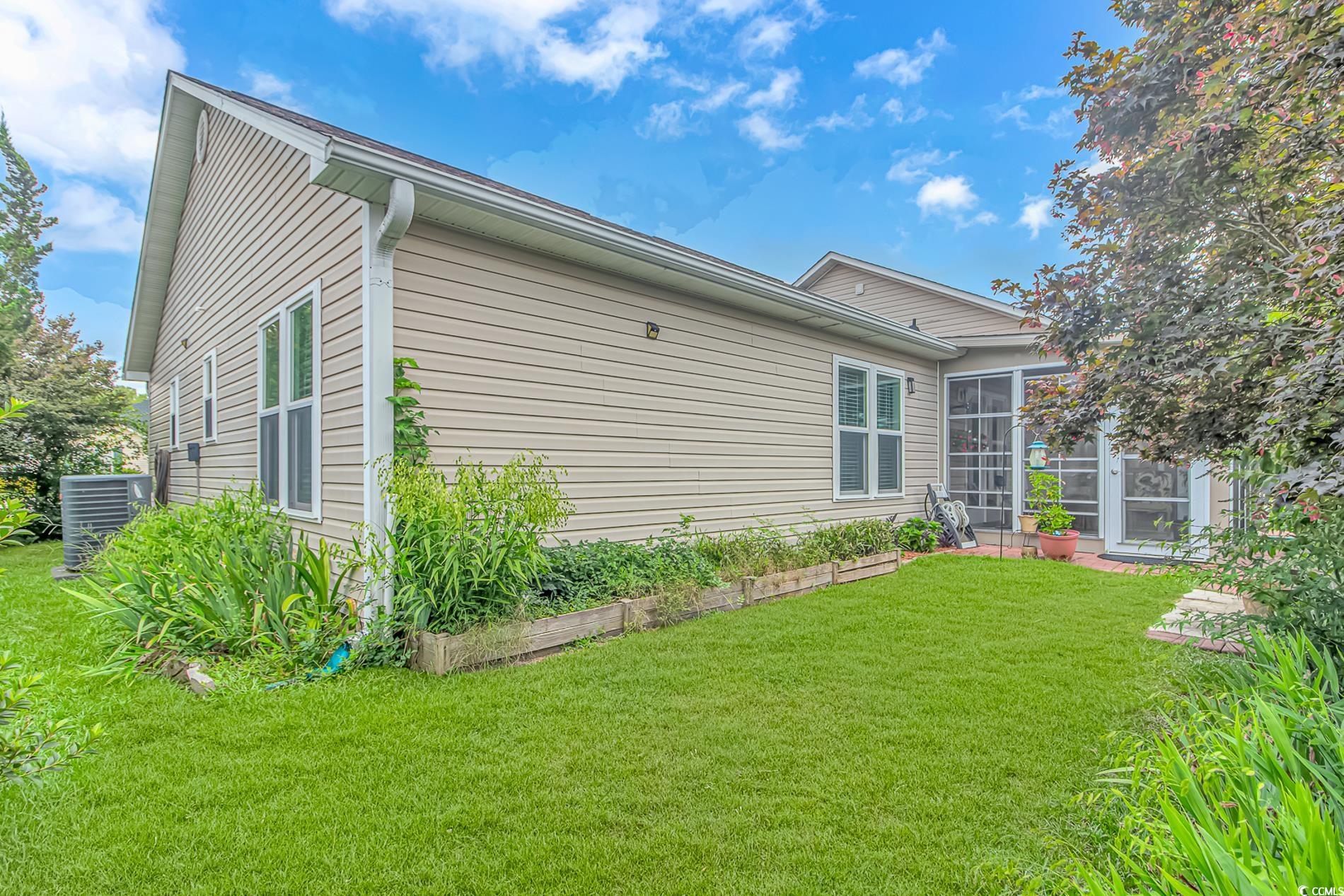 441 Plymouth Loop Longs, SC 29568 - Photo 23 of 33 View of side of home featuring central air conditi