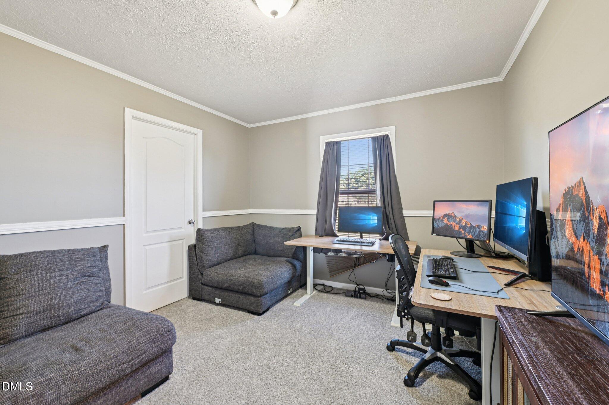 2186 Piney Grove Church Road Kenly, NC 27542 - Photo 19 of 30 a living room with furniture and a flat screen tv