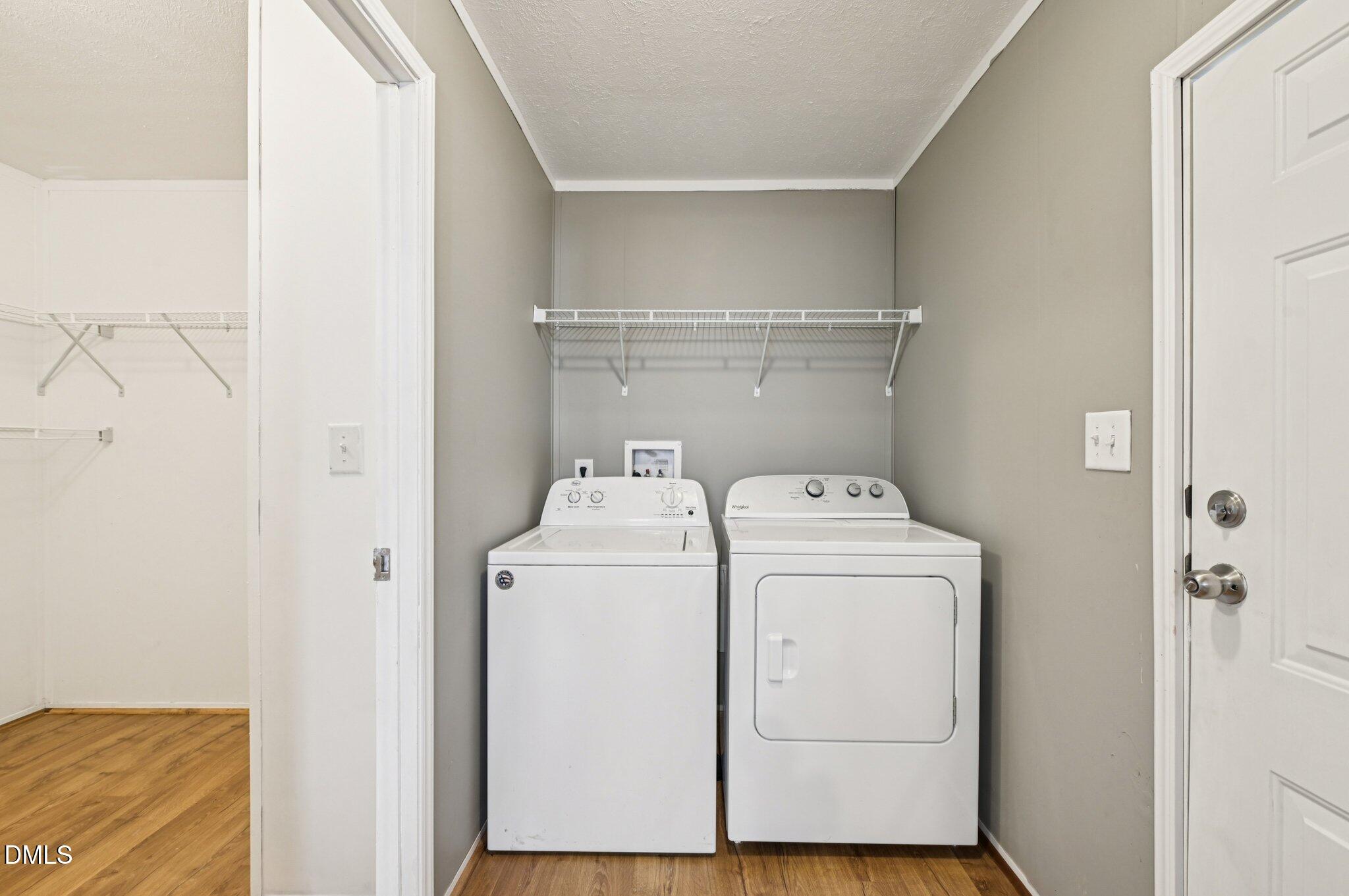 2186 Piney Grove Church Road Kenly, NC 27542 - Photo 23 of 30 a utility room with dryer and washer