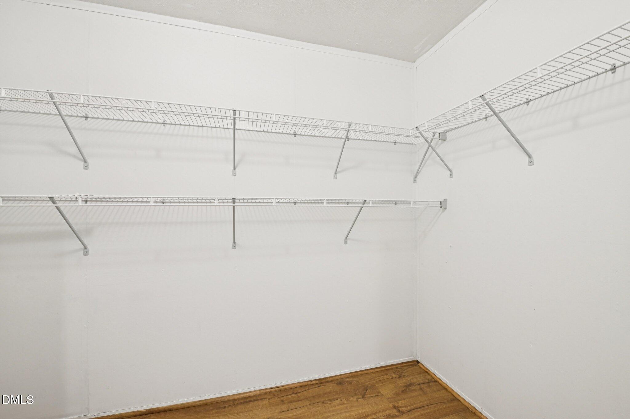 2186 Piney Grove Church Road Kenly, NC 27542 - Photo 24 of 30 a view of a room with racks on the wall