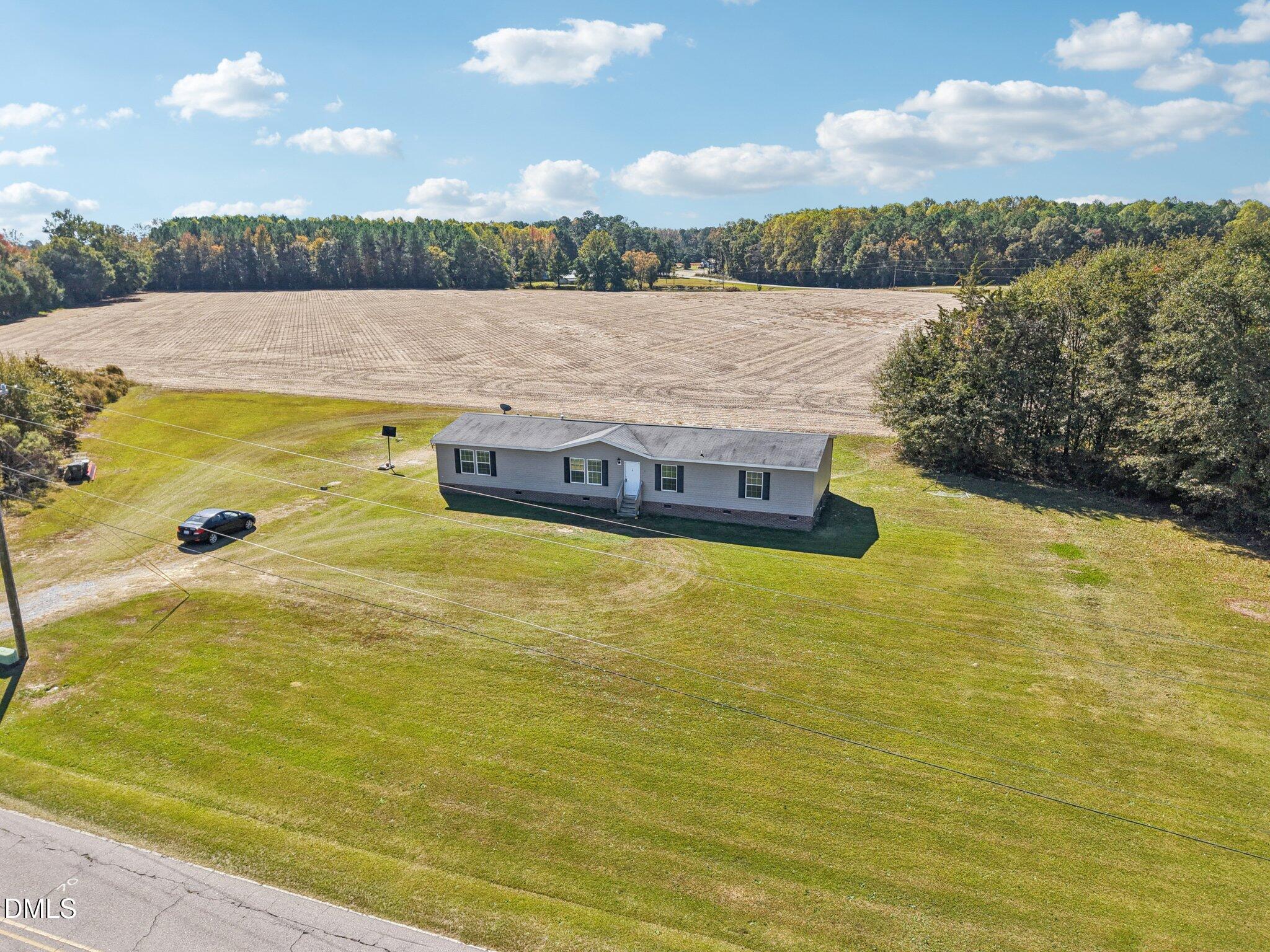 2186 Piney Grove Church Road Kenly, NC 27542 - Photo 26 of 30 a view of a lake