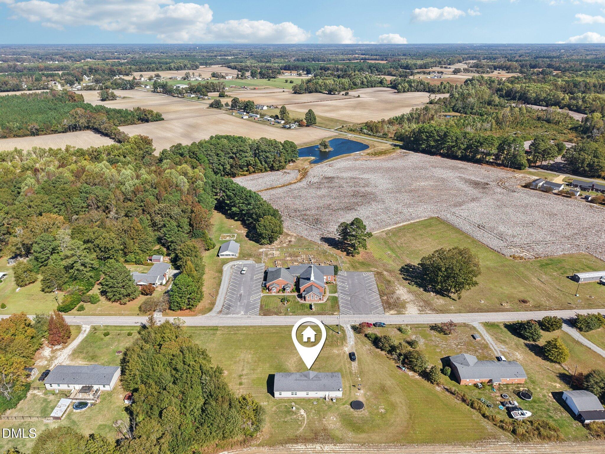2186 Piney Grove Church Road Kenly, NC 27542 - Photo 29 of 30 an aerial view of residential houses with outdoor space