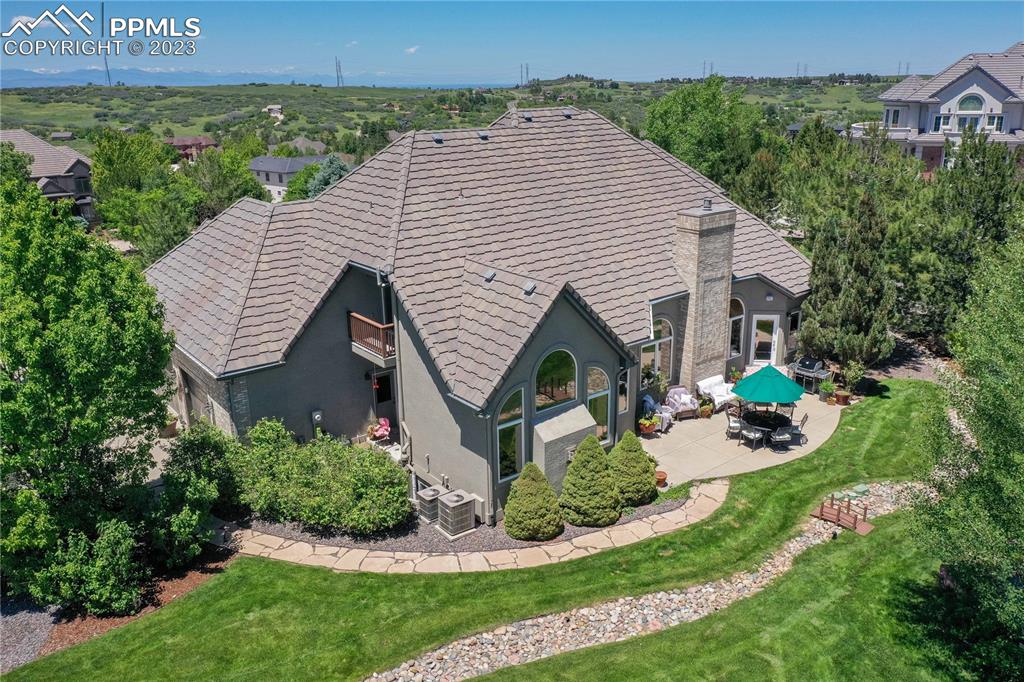 8760 Ridgepointe Drive Castle Pines, CO 80108 - Photo 11 of 50 an aerial view of a house