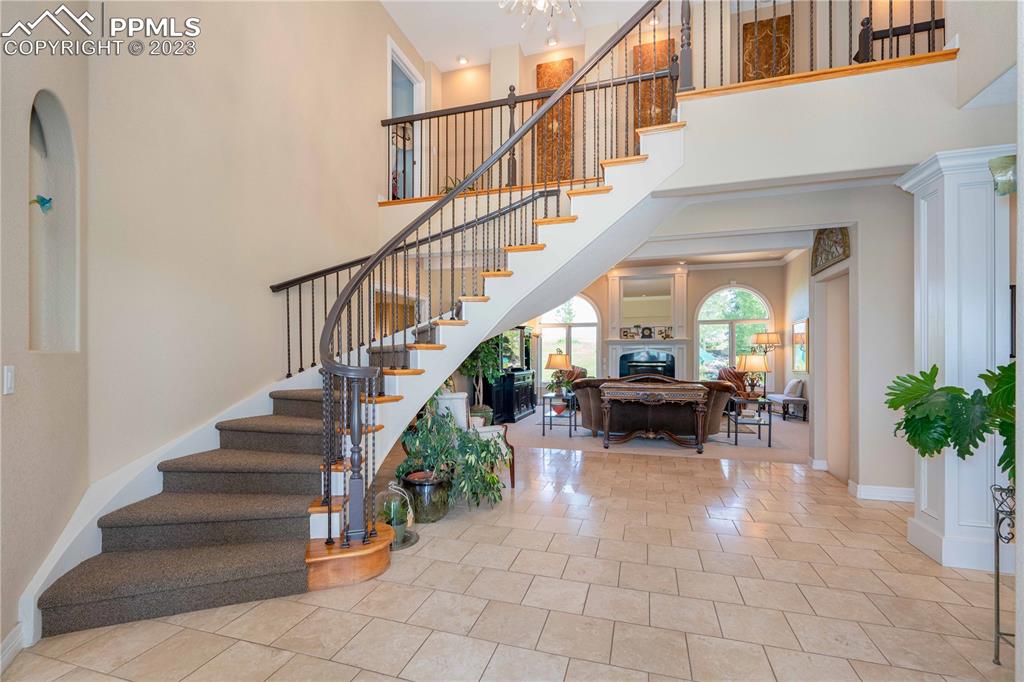 8760 Ridgepointe Drive Castle Pines, CO 80108 - Photo 13 of 50 a view of entryway and hall