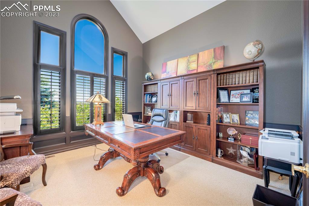 8760 Ridgepointe Drive Castle Pines, CO 80108 - Photo 23 of 50 a workspace with furniture and a window