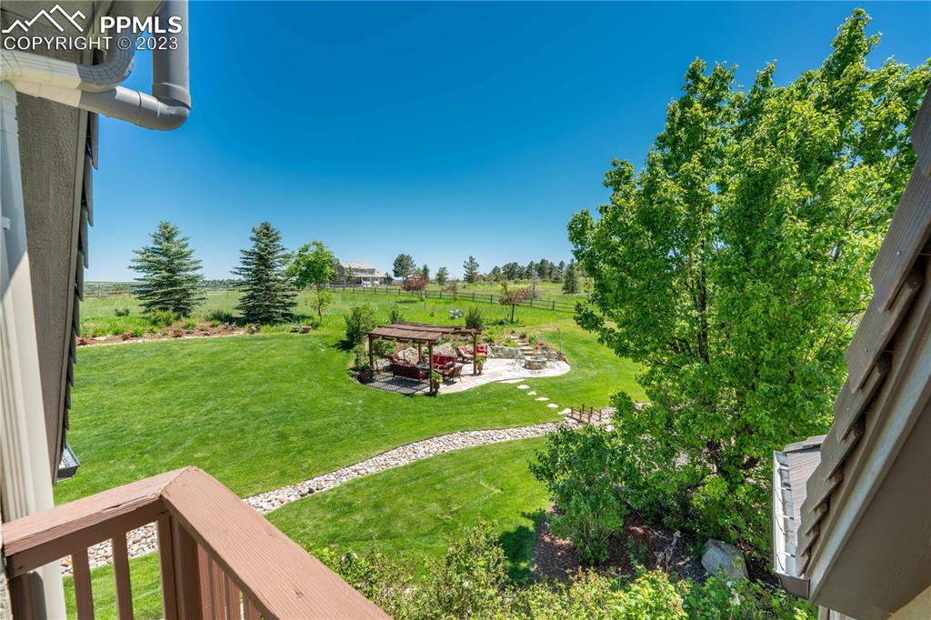 8760 Ridgepointe Drive Castle Pines, CO 80108 - Photo 29 of 50 a view of a two chairs in a yard