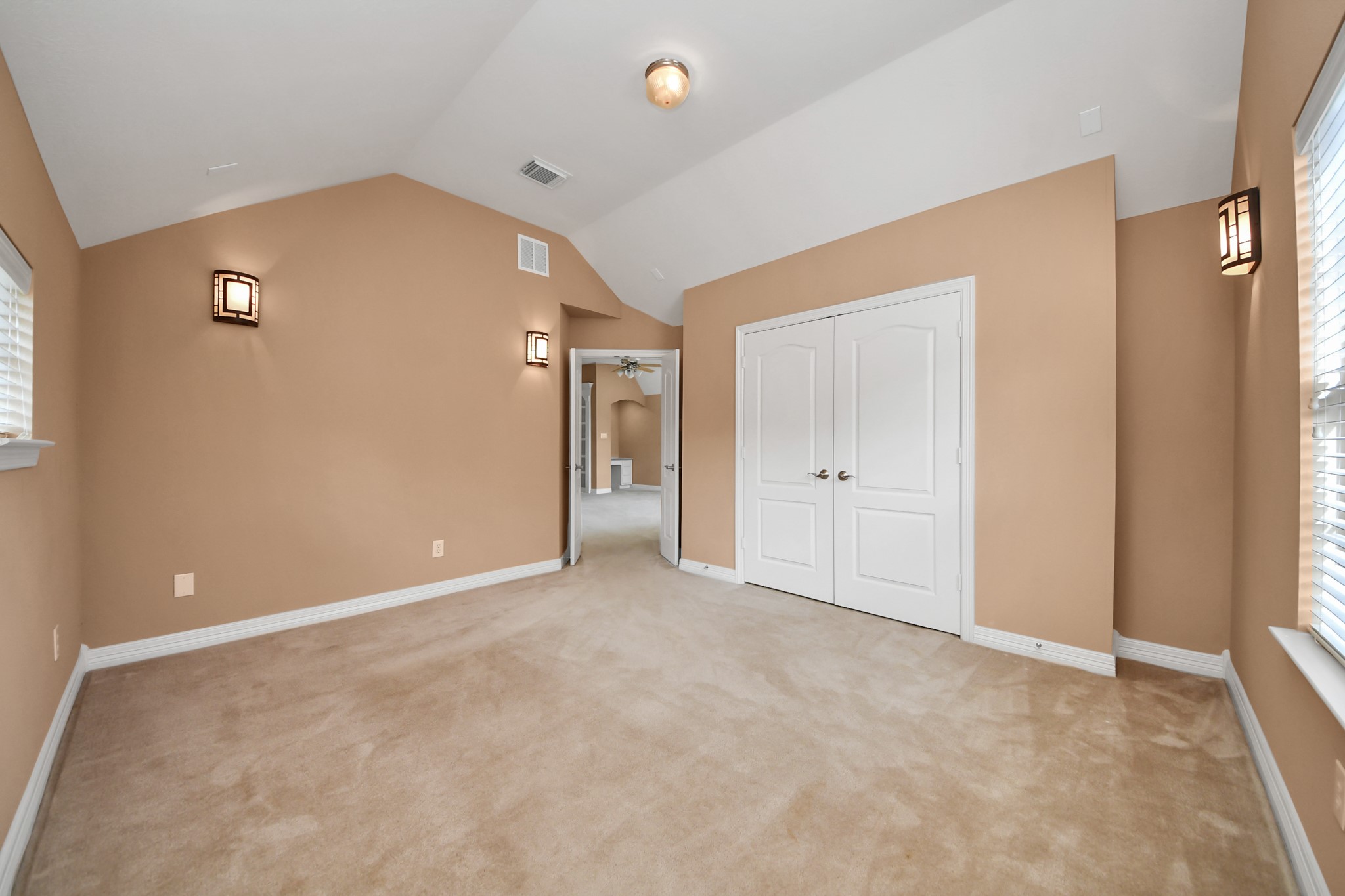 17618 Raven Canyon Lane Houston, TX 77095 - Photo 28 of 45 Charming bedroom with soft natural light, featuring modern lighting and a peaceful atmosphere.