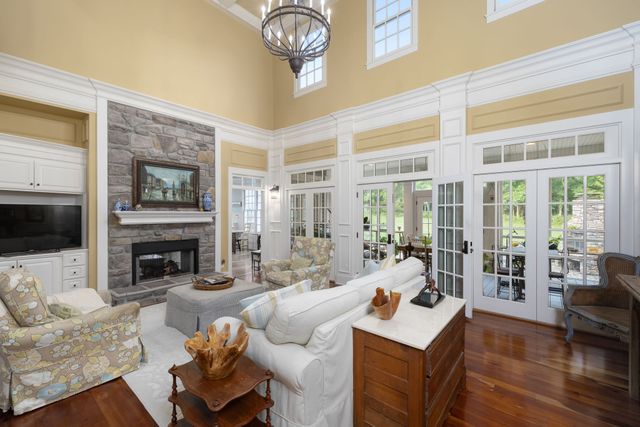 a kitchen with stainless steel appliances granite countertop a stove and refrigerator