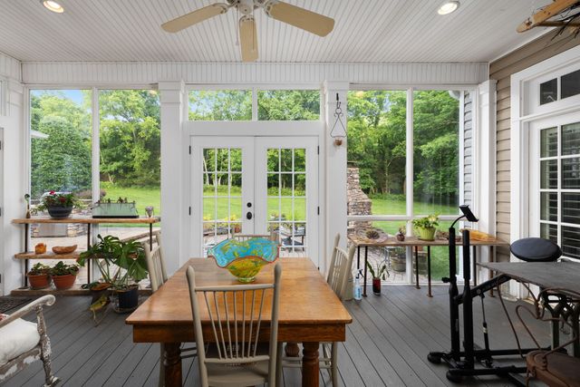 a bathroom with a sink toilet and mirror