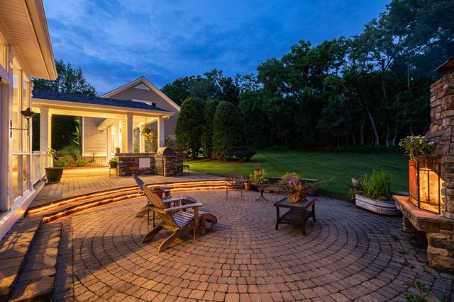 a view of a porch with wooden floor and outdoor space
