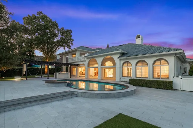 a front view of a house with a yard and porch