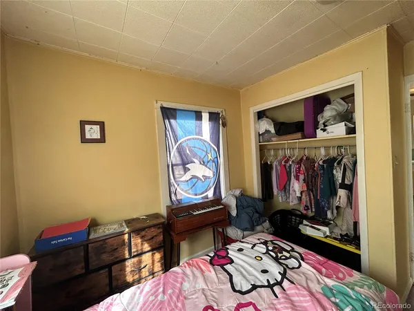a living room with lots of furniture and a flat screen tv
