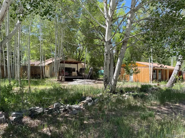 a backyard of a house with seating space
