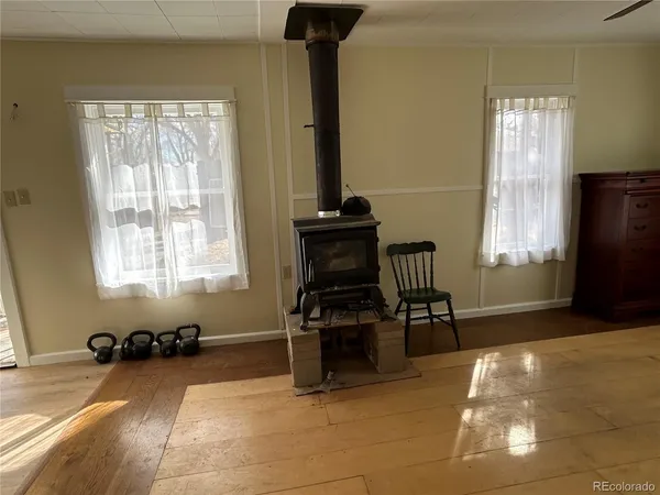 a room with furniture and a window