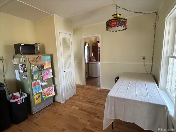 a view of livingroom with furniture and toys